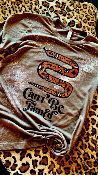 Can’t Be Tamed Tee